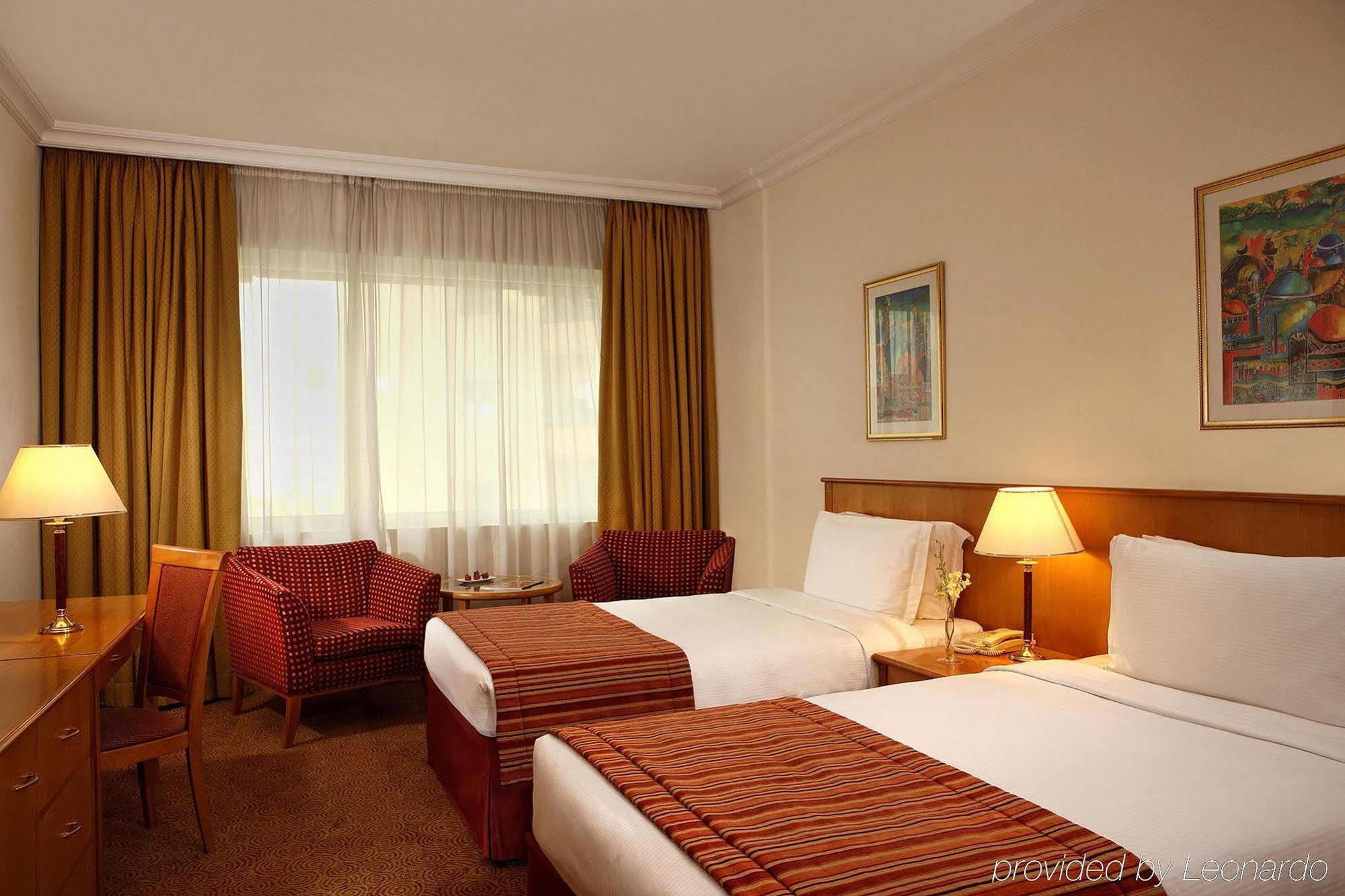 Swiss-Belhotel Sardzsa Szoba fotó